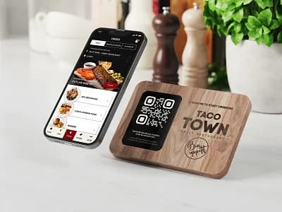 QR code engraved on a wooden disc